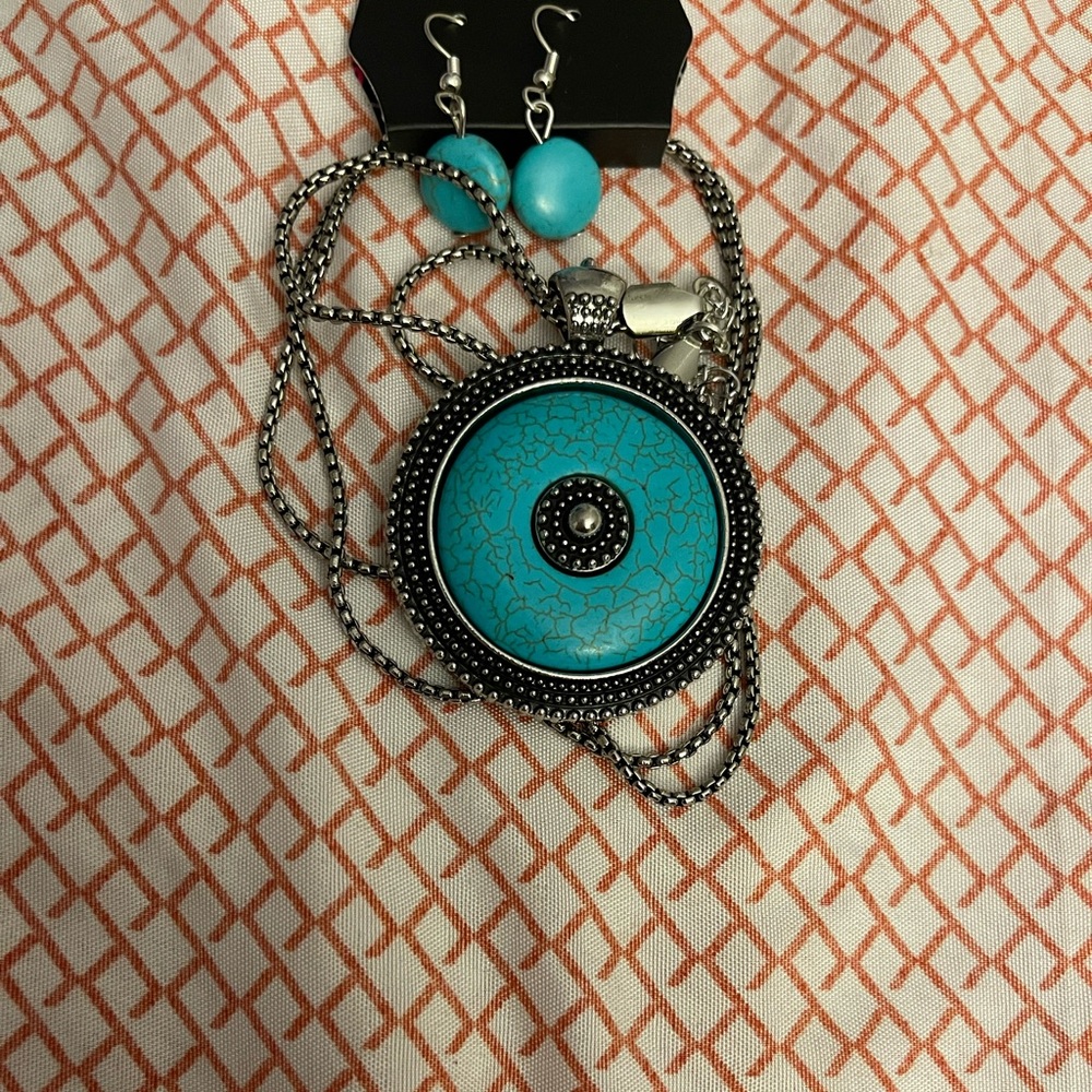 Brand new turquoise necklace and ear rings